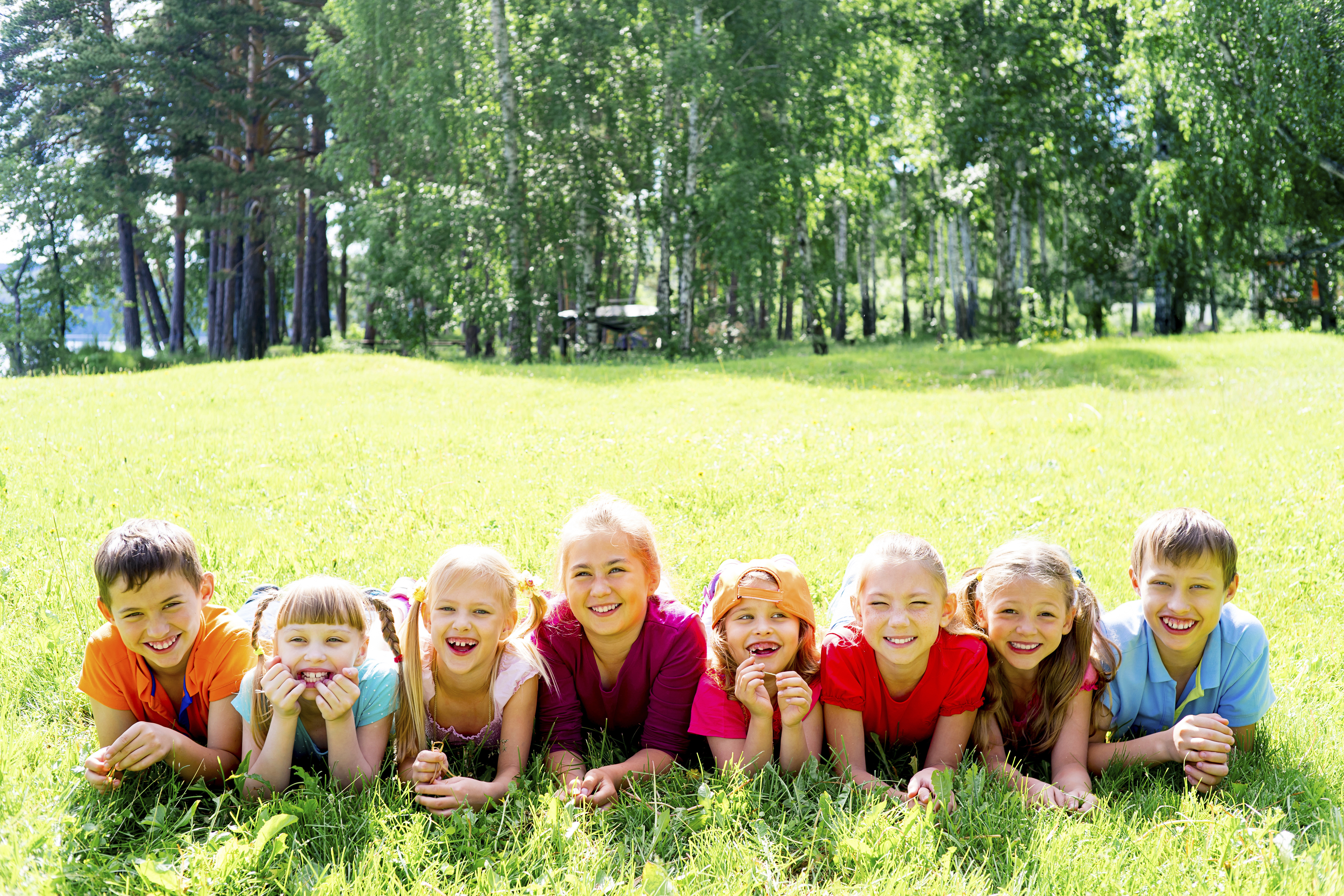 Children playing outside after taking standardized tests