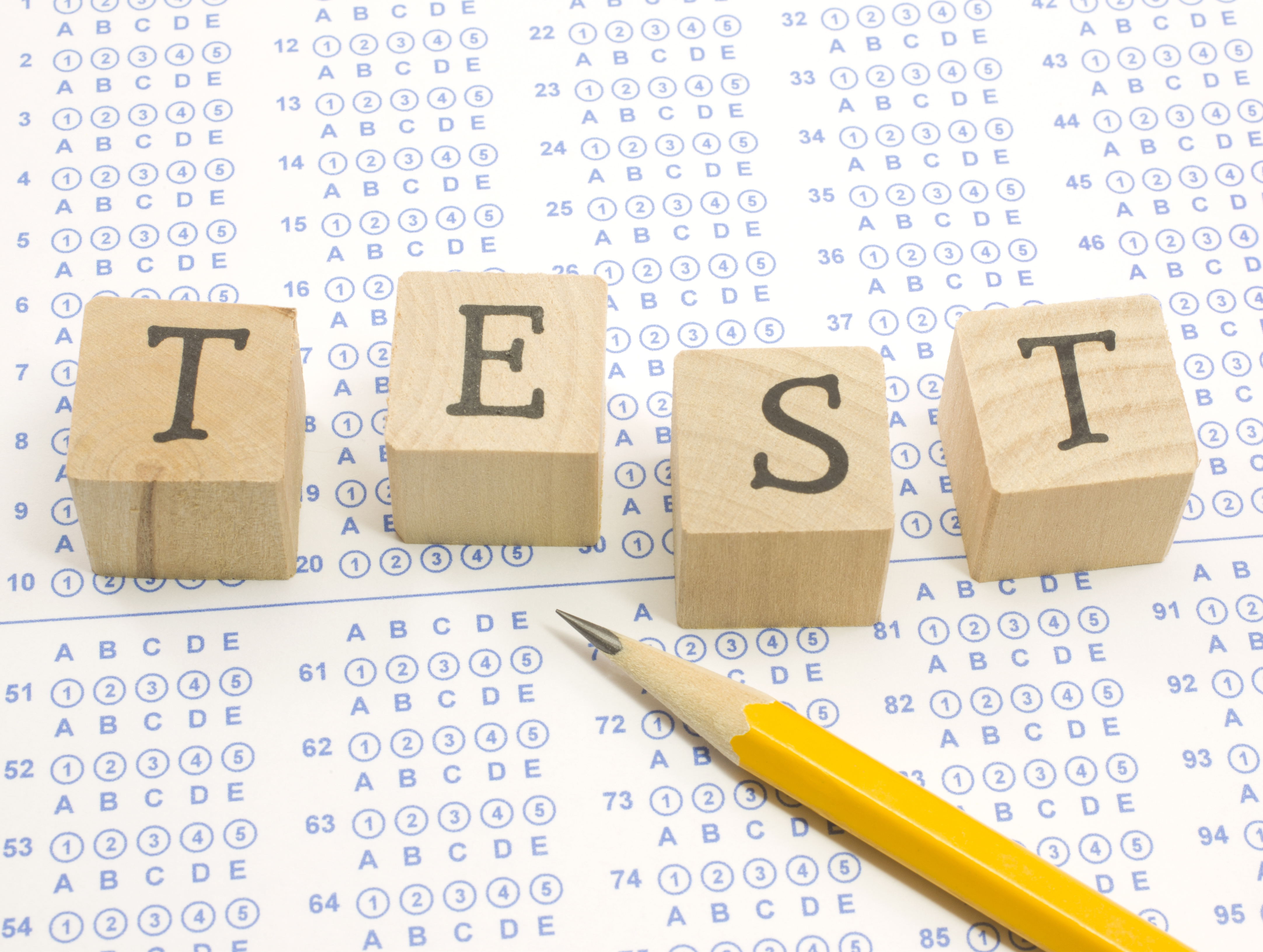 Standardized test and pencil on elementary classroom desk