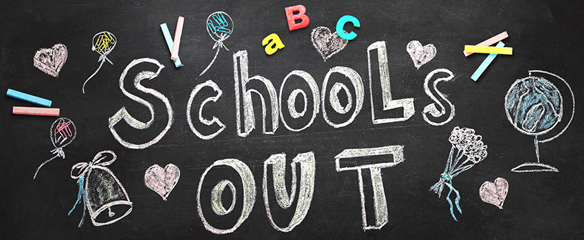School's out written on chalkboard School's out written on chalkboard