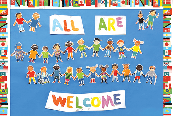 Classroom Bulletin Board decorated with All Are Welcome Bulletin Board Set