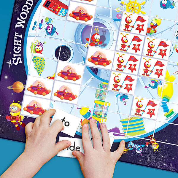 Child playing with space-themed Sight Words Bingo Child playing with Sight Words Bingo Game