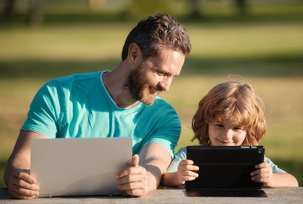 Father teaching child distance learning education lesson